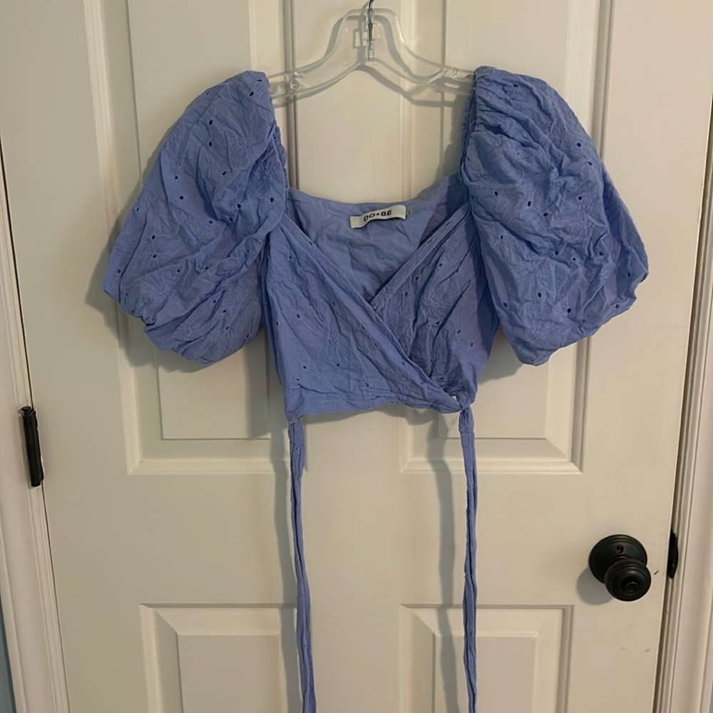 Blue puff sleeve wrap around top
